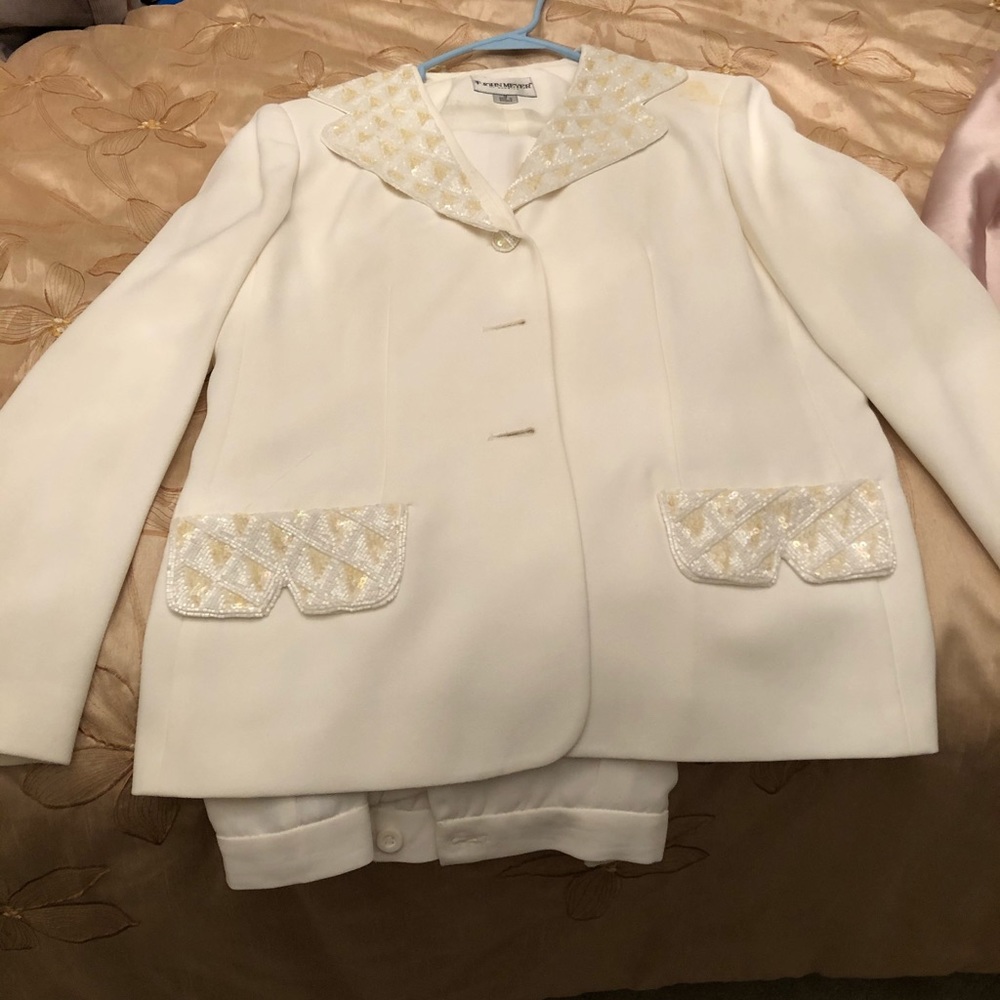 Beautiful pants suit small stain on the left side